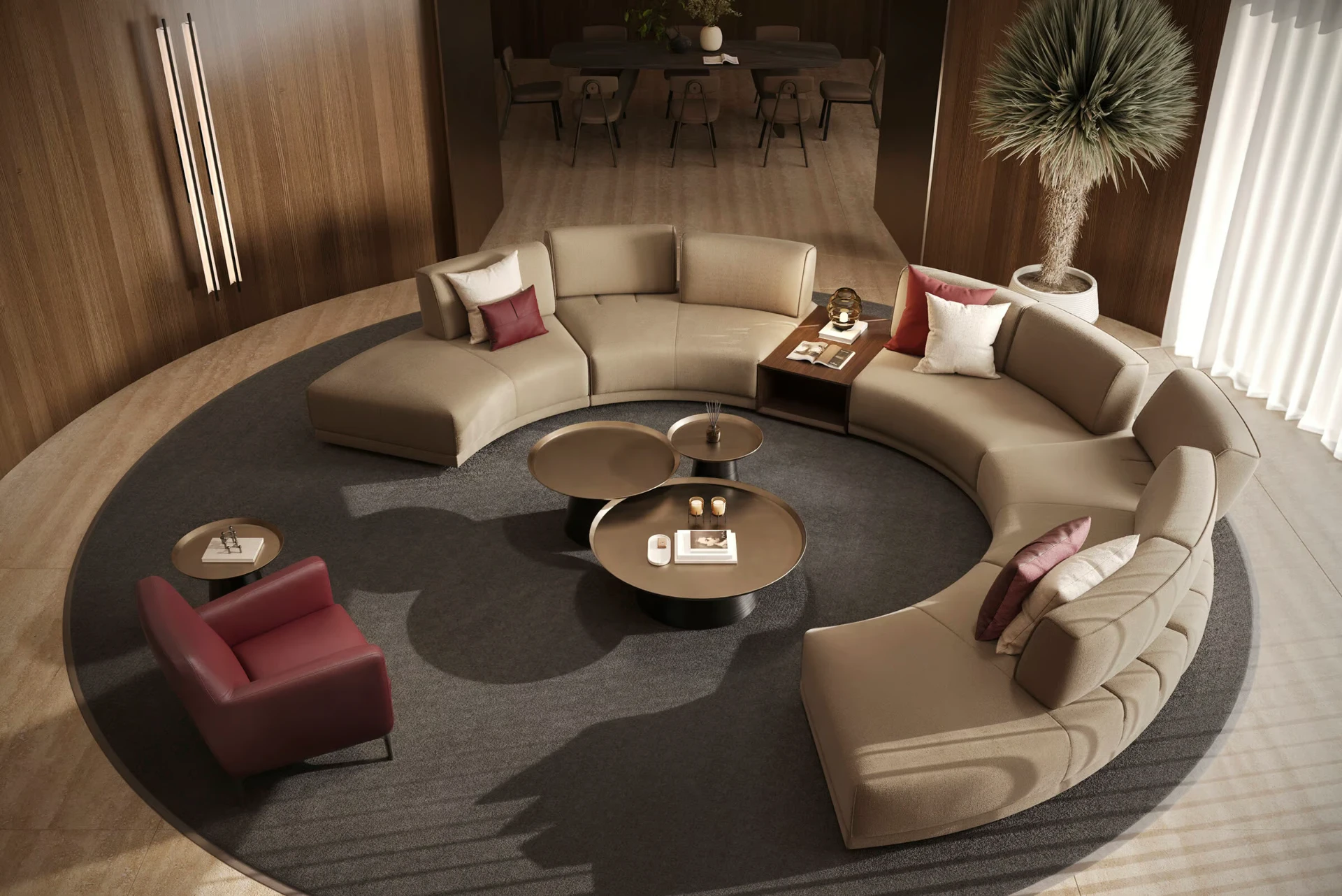 Curved modular sofa and round tables in a warm modern lounge